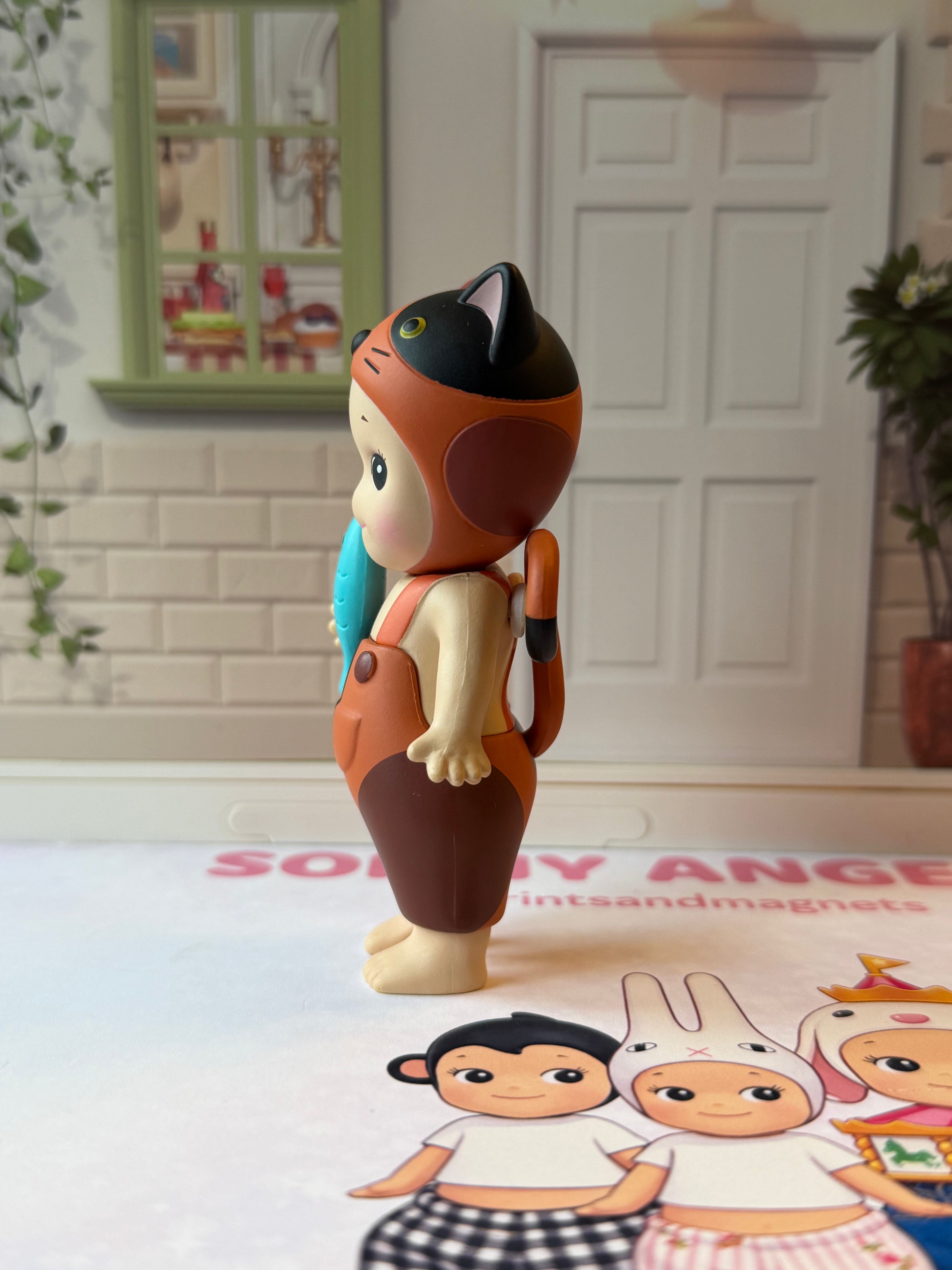 Sonny Angel Cat Life - Brown and Black cat holding fish